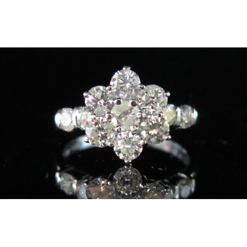 261 - A 2ct Diamond Floral Cluster Ring in a .950 platinum setting, 13mm head, size Q.5, 7g