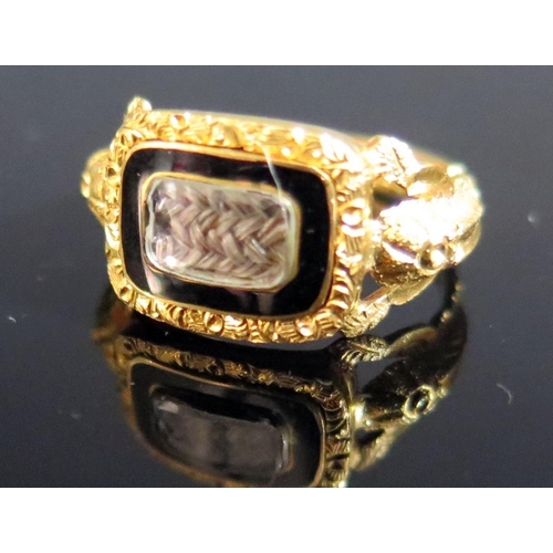 311 - A Victorian 18ct Gold and Enamel Memorial Ring with glazed woven hair panel and inscription to the b... 