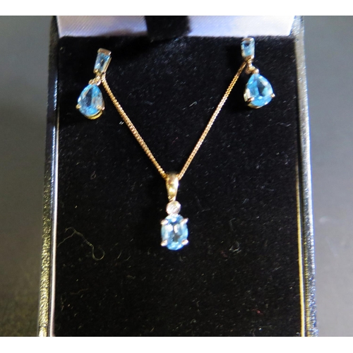 36 - A 9ct Gold, Aqua Marine and Diamond Pendant Necklace with 16mm drop (clasp needs replacing) with pai... 