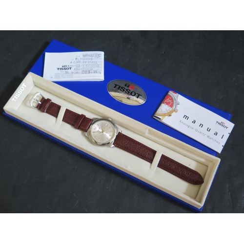 394 - A TISSOT Gent's Wristwatch, boxed and with papers, running