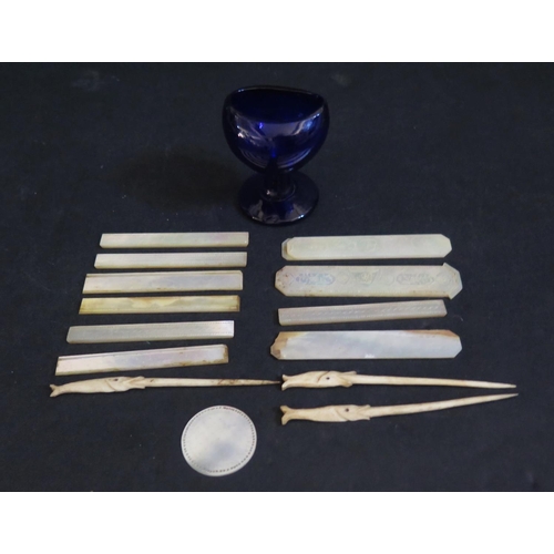 535 - A Selection of Carved Mother of Pearl Panels, gaming counter and three bone toothpicks