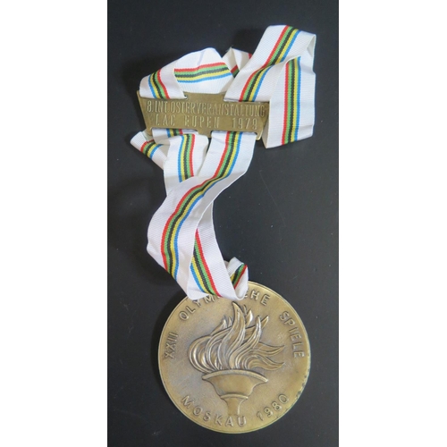 545 - A 1980 Moscow (MOSKAU) XXII Olympic Medal with 8 INT. OSTERVERANSSTALTUNG LAC EUPEN 1979 bar  **SOLD... 