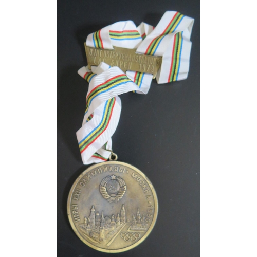 545 - A 1980 Moscow (MOSKAU) XXII Olympic Medal with 8 INT. OSTERVERANSSTALTUNG LAC EUPEN 1979 bar  **SOLD... 