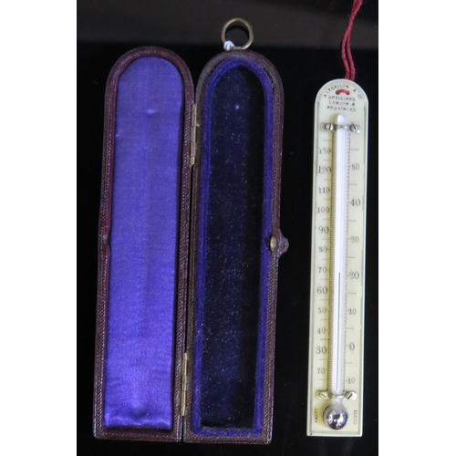 554 - An Aitchison & Co. Thermometer in leather case, c. 13.5cm