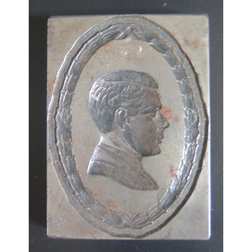 555 - A Steel Book Plate bearing the bust of Edward VII? bordered by a wreath, 71x51mm