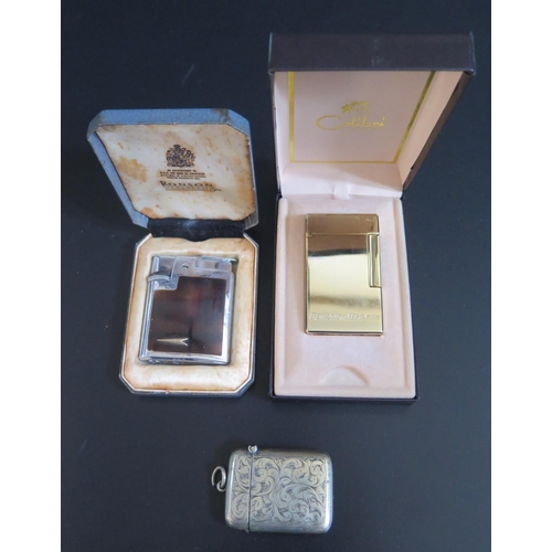 574 - A Calibri Benson & Hedges Cased Lighter (working), Ronson lighter (not tested) and silver plated ves... 