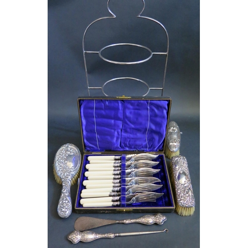 605 - Silver Backed Brushes, silver handled button hook and shoe horn, plated fish eaters and cake stand