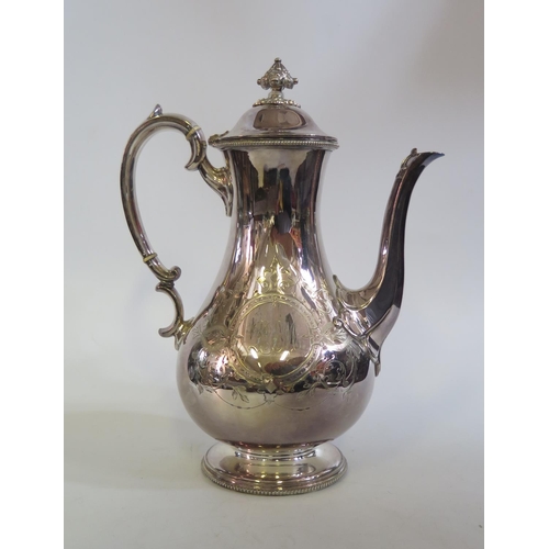 708B - A Silver Plated Coffee Pot with chased decoration and An Electroplated Silver Galleried Tray, 31x20c... 