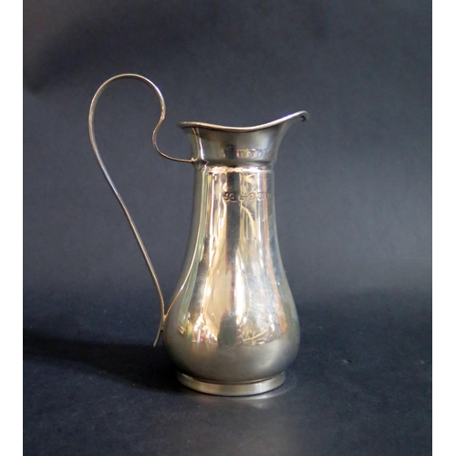 749 - A George V Silver Cream Jug, 13cm, Birmingham 1911, Joseph Gloster Ltd., 104g