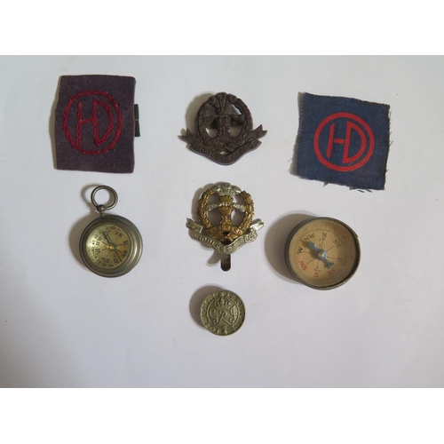 759 - Two Middlesex Regimental Cap Badges, compasses etc.