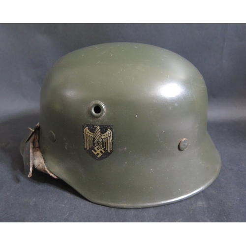 763 - A WWII German Army Model 1935 Type Double Decal Lightweight Aluminium Parade Helmet, with original l... 