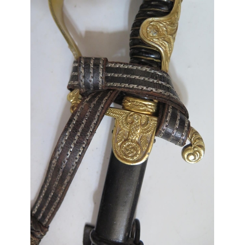 769 - A WWII German Army Officer's Dress Sword with portepee by Emil Voss?, with Eagle and Swastika on knu... 