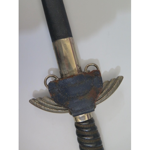 770 - A WWII German Luftwaffe Sword maker S.M.F., guard marked 105, guard and scabbard stamped Fl. E.A. 16... 