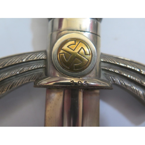 770 - A WWII German Luftwaffe Sword maker S.M.F., guard marked 105, guard and scabbard stamped Fl. E.A. 16... 