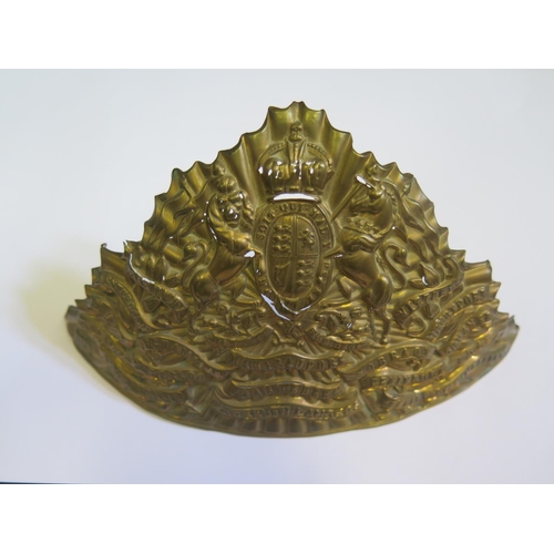 792 - A Military Brass Helmet Badge