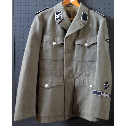 797I - A WWII German SS Tunic with later cloth badges