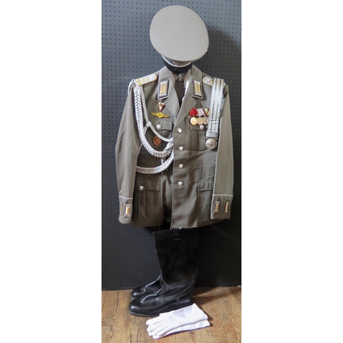 797K - A G.D.R. Army Uniform, complete with tunic, shirt, tie, trousers, cap, gloves, belt and boots