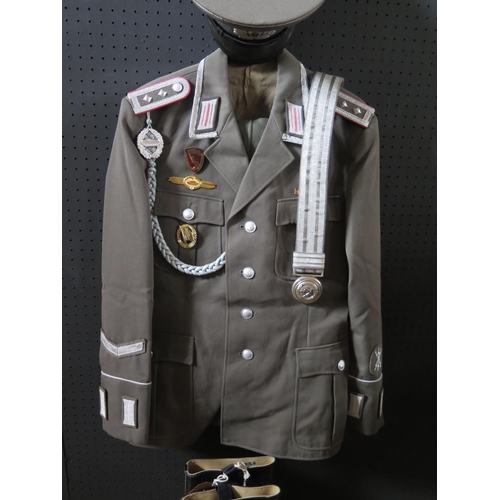 797L - A G.D.R. Army Uniform, with tunic, trousers, cap, gloves, belt and boots