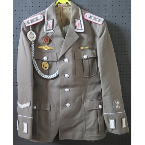 797L - A G.D.R. Army Uniform, with tunic, trousers, cap, gloves, belt and boots