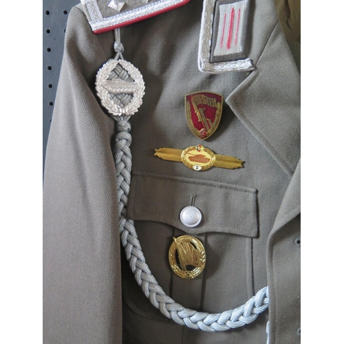 797L - A G.D.R. Army Uniform, with tunic, trousers, cap, gloves, belt and boots