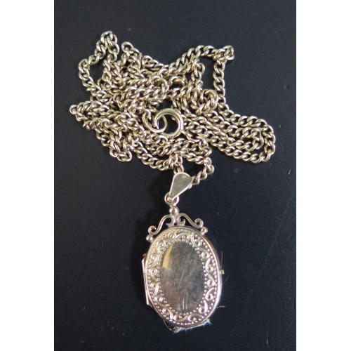 87 - A Hallmarked 9ct Gold Locket and Chain, 32mm drop, 9.8g