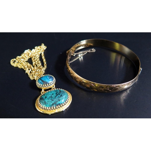 91 - A Gold Plated Malachite Pendant Necklace and rolled gold hinged bangle with chased foliate decoratio... 