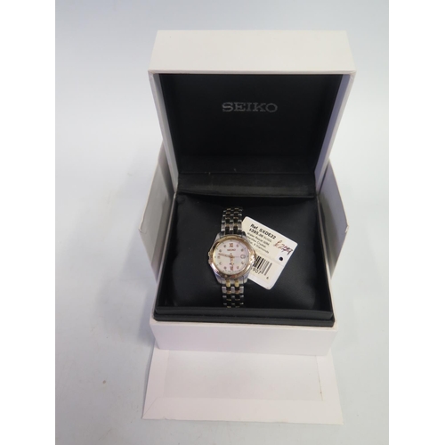 385A - A Boxed Ladies Seiko Wristwatch with mother of pearl and diamond set dial. Needs battery, not tested