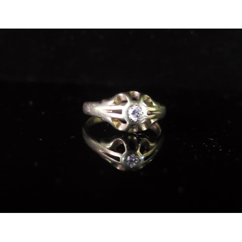 54 - A Diamond Solitaire Ring in an unmarked gold setting, size O, 2.9g, .1ct DW