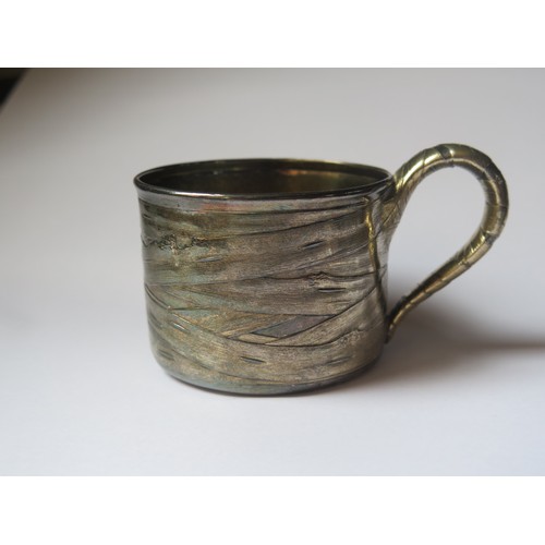 677 - A 19th Century Russian Trompe l'oeil Silver Mug and other odd silver, 247g marked silver