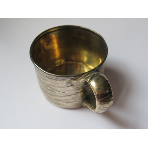 677 - A 19th Century Russian Trompe l'oeil Silver Mug and other odd silver, 247g marked silver