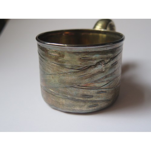 677 - A 19th Century Russian Trompe l'oeil Silver Mug and other odd silver, 247g marked silver