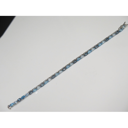 103 - A Sterling Silver Multi Stone Set 7.75