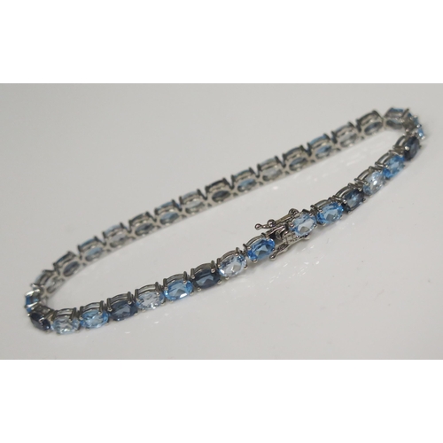 103 - A Sterling Silver Multi Stone Set 7.75