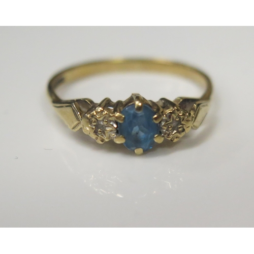 110 - A 9ct Yellow Gold, Blue Topaz and Diamond Set Ring, size L, 1.7g