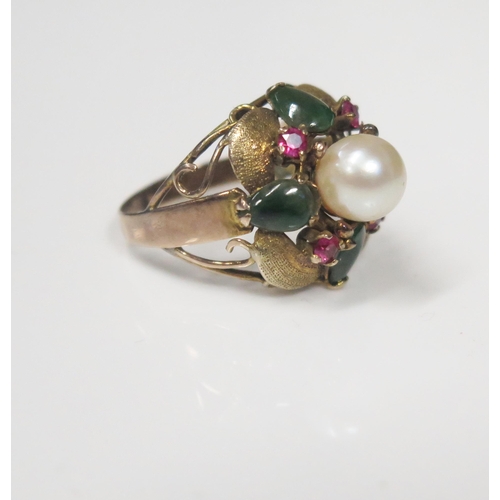 111 - A Cultured Pearl, Jadeite and Ruby Ring in an unmarked gold setting, 18mm dead, size J.5, 4.2g