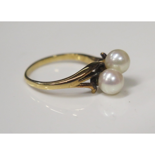 68 - A 14ct Gold and Twin Pearl Crossover Ring, 6mm pearls, size O, 3.5g