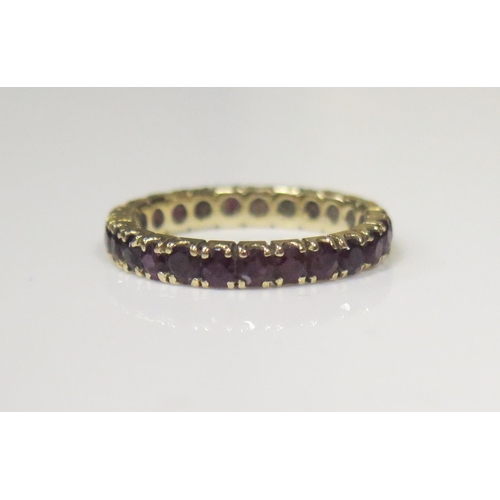 79 - A Ruby 25 Stone Full Eternity Ring, size 0, 2.2g