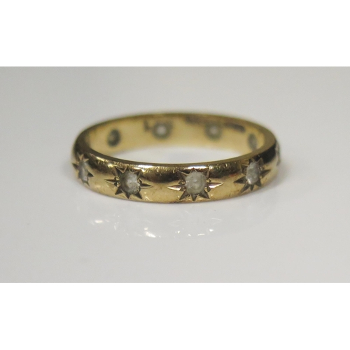 80 - A 9ct Gold and White Stone Full Eternity Ring, size p< 3g