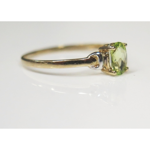 86 - A 9ct Yellow Gold and Peridot Dress Ring, size O.5, 0.8g