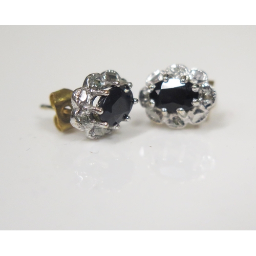90 - A Pair of 9ct White Gold and Sapphire Stud Earrings, 10x8mm heads, 1.4g