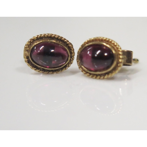 95 - A Pair of 9ct Yellow Gold Cabochon Garnet Stud Earrings, 0.8g