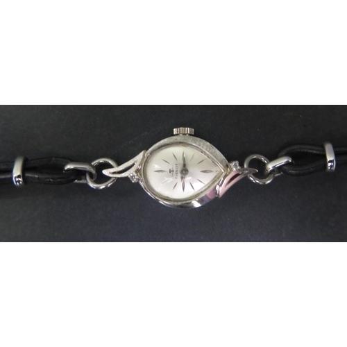 1647 - A Ladies TISSOT 14K White Gold and Diamond Wristwatch, with 17 jewel manual wind movement no. 731481... 