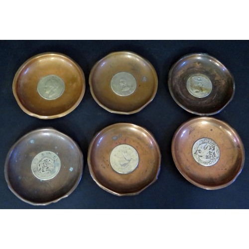 1271 - A Set of Six Silver Coin Set Ashtrays including American 1877 Dollar, Chinese, Japanese, Nederlands,... 