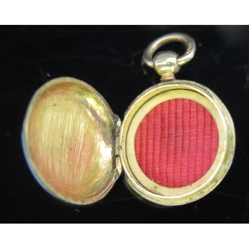 1527 - A 19th Century French 18ct Gold and Enamel Miniature Faux Watch Fob, 11.5mm diam., 1.3g
