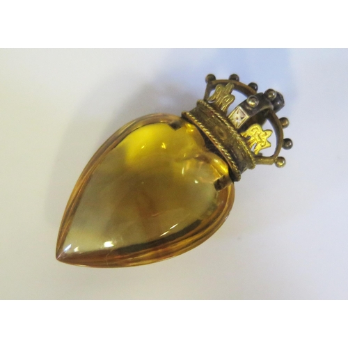 1528 - An Antique Yellow Crystal Glass Heart surmounted with a gilt crown, 36x19mm