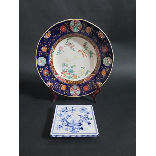 156 - A 19th Century Ashworth Ironstone Soup Plate (26cm) and Meissen Onion Pattern Trivet (A/F)