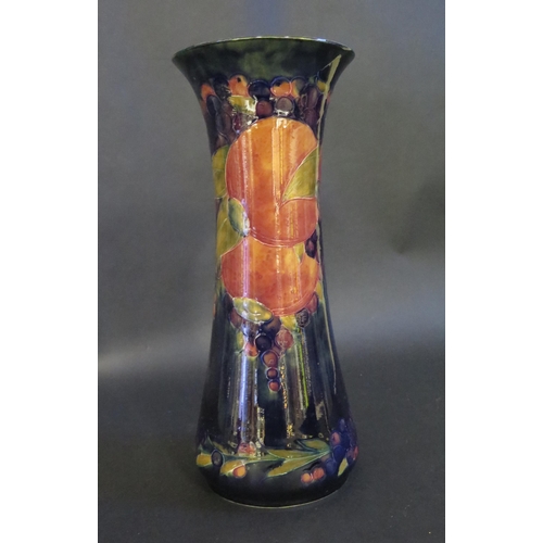 165 - A William Moorcroft Pomegranate Decorated Vase, 32cm, impressed marks and signed to the base