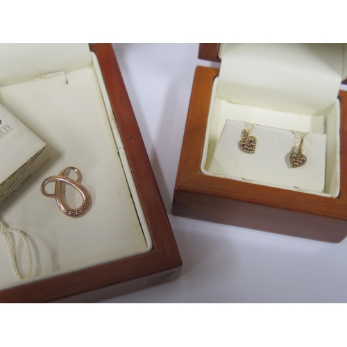 1658 - Two Pair of Boxed Clogau Gold Earrings and a pendant, 4.1g