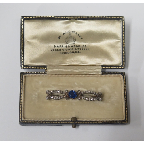 1677 - A Victorian  Mappin & Webb Cased Sapphire and Diamond Brooch, 5.7mm central stone, 38mm long, 3.4g