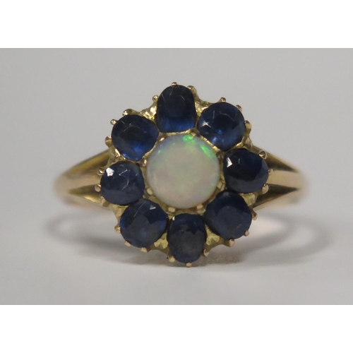 1680 - An Antique Opal and Sapphire Cluster Ring in an unmarked yellow gold setting, size P.5, 3.3g